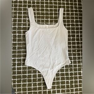 Aritzia Cream Thong Bodysuit